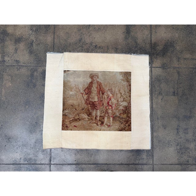 This original French tapestry fragment dating to the 1850s showcases an idyllic countryside scene with two youthful...