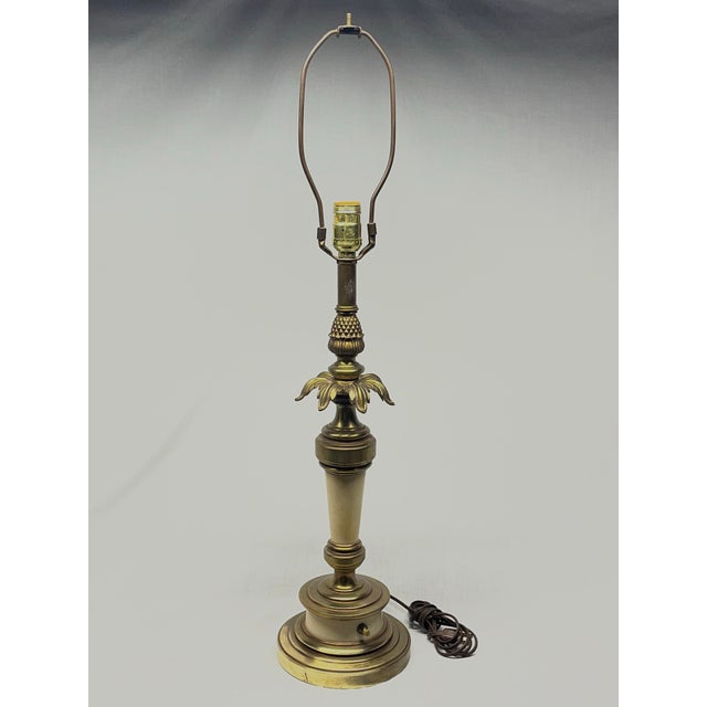 Elevate your space with this classic mid-century luxury table lamp manufactured by the renowned Stiffel Lamp Company....