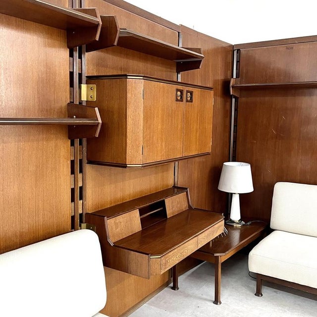 Modular bookcase with bar, desk, and sofas by La Permanente Mobili Cantù, 1960s. The various elements of the bookcase can...