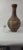 Large 18.5-inch 1970s pottery vase with raised Chinese court figures, horse-drawn chariot relief, geometric key-fret...