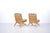 A set of two rare Scissor Chairs, attributed to Pierre Jeanneret. Made of solid ash wood, with original seat cushions...