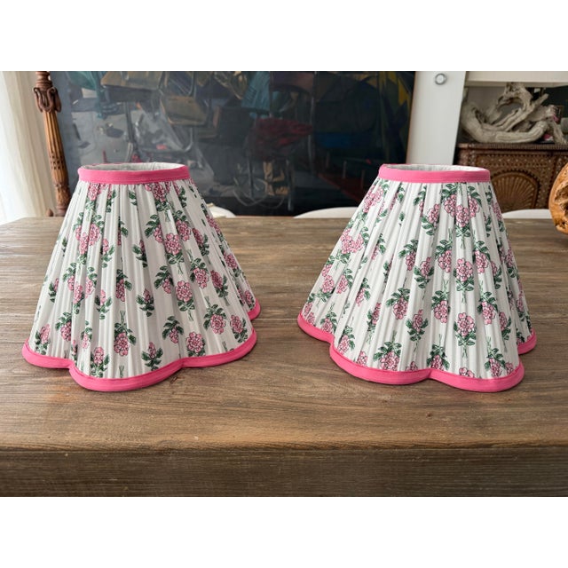 Pair of handmade scalloped shape, pleated classic floral Roller Rabbit fabric lampshades. Lampshade dimensions: 9” H x 12”...