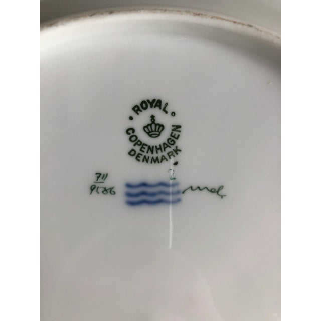 A wonderful set of 6 mid century Royal Copenhagen dinner plates in the brown iris pattern. Each plate is 9 7/8” in dia.