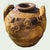 massive antique Chinese earthenware Martaban Dragon Jar of brown and mustard glaze depicting a pair of celestial dragons...