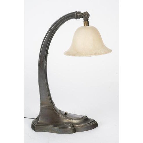 This authentic art nouveau table lamp, dating from circa nineteen ten, is a rare decorative piece that captures the...