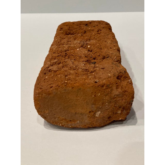 Antique red clay brick reclaimed from 19th century building at Northwest corner of South Broadway, and West Colorado...