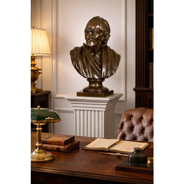 JEAN-ANTOINE HOUDON (after) French, 1741-1828 "Bust of Voltaire" Patinated bronze | signed to reverse HOUDON Foundry...