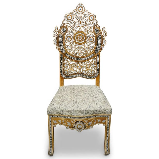 This Moroccan Love Seat and pair of chairs are true antique pieces from the early 1900s. The rich brown color and...