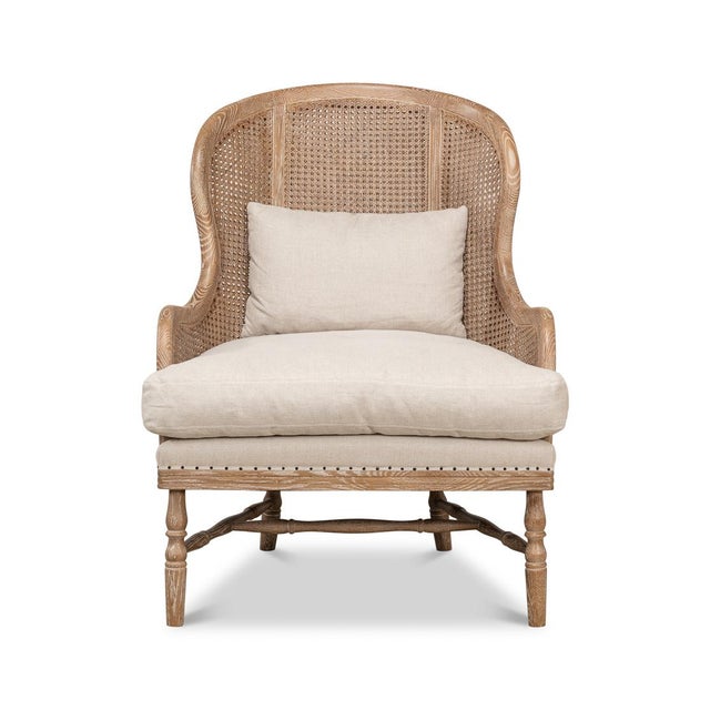 Crafted from sturdy oak, this chair features a beautiful white wash finish that exudes classic French charm. The...