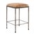 Hand hammered and embossed iron frame counter stool with soft caramel tone hide seat. Each will vary in natural hide...