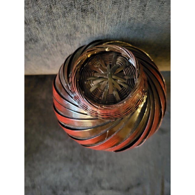 Unique red wicker vase with ceramic insert. Made in the Late 20th Century.