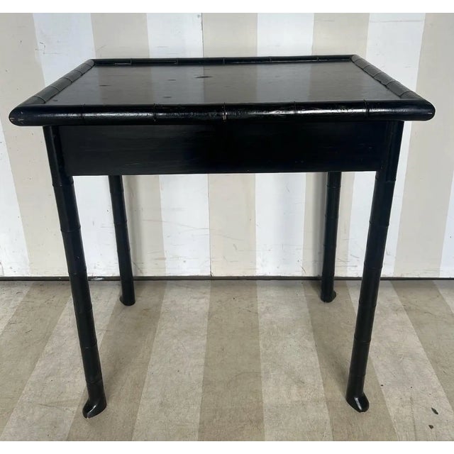 19th Century French Faux Bamboo Black Painted Side Table with Drawer and Flared Feet.