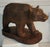 This fine large hand carved brown bear has amazing details in the carving.The condition is very good.This came from a log...
