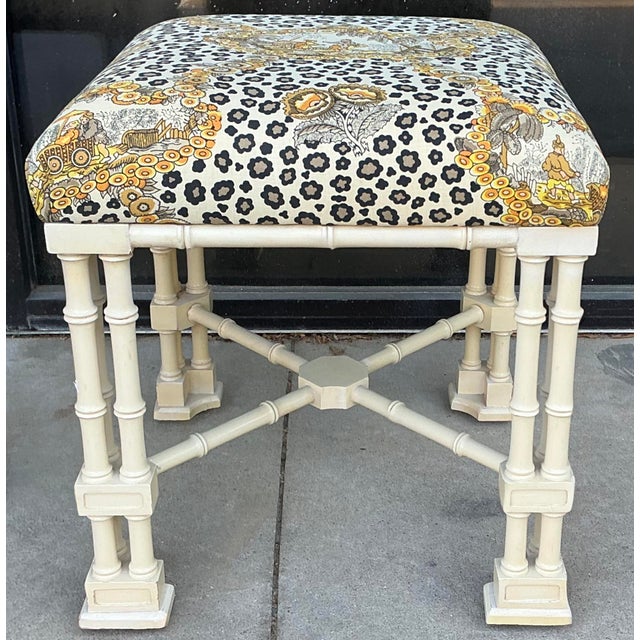 This is a pair of mid-century Chinese Chippendale carved fruitwood ottomans . They have been upholstered in vintage...