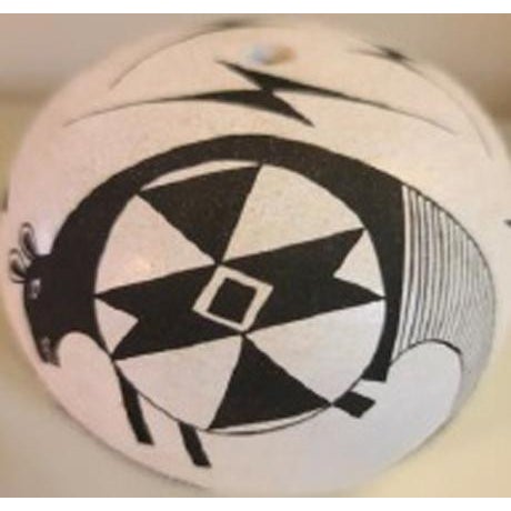 This is a beautiful example of pottery from the Acoma Pueblo. This seed jar is well appointed with Mimbres animals and...