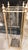 A striking antique brass umbrella stand, featuring a substantial cast iron base and a beautifully aged brass patina....