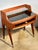 A remarkable pair of bedside tables (or end tables) in flame mahogany veneer, representative of prestigious Milanese...