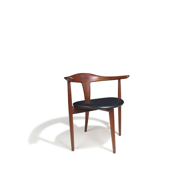 Exquisitely hand-sculpted armchairs by Erik Andersen and Palle Pedersen for Randers Møbelfabrik, showcasing exceptional...