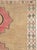 This Mid-20th century Turkish Anatolian room-size carpet presents a spacious, balanced composition centered by three...
