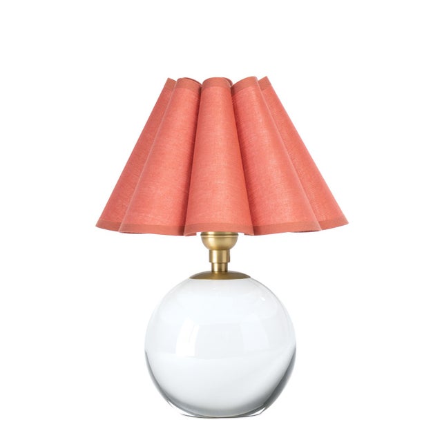 The Giorgio Mini Table Lamp provides a soft, inviting glow through its wild poppy scalloped shade, making it a perfect...
