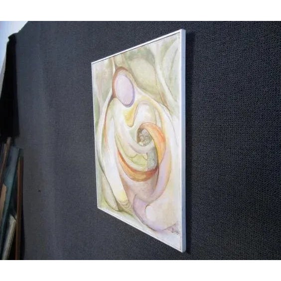 This vintage painting depicts an abstracted figure in swirling colors. The painting is framed and signed by the artist....