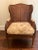 Rare French Louis XVI style (19th century) mahogany wing chair with carved frame and double cane seat, back, and arms....