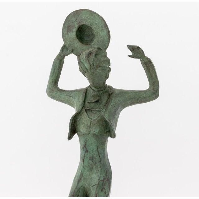 Tanya Poust (American, XX) Flamenco Dancer Verdigris Patinated Bronze Sculpture, mounted on a circular black marble base....