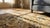 Georgous Sand Colored Floral Design With a Hint of Navy Blue Antique Kirman Rug For Sale - Image 10 of 11