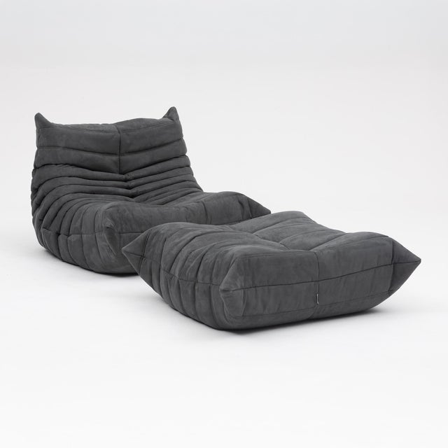 Original Ligne Roset Togo fireside chair with matching ottoman, designed by Michel Ducaroy in 1973 and sourced directly in...