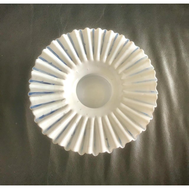 Stunning translucent white modern art glass bowl - fan shaped round design - milk glass with hues of blue - no marking of...