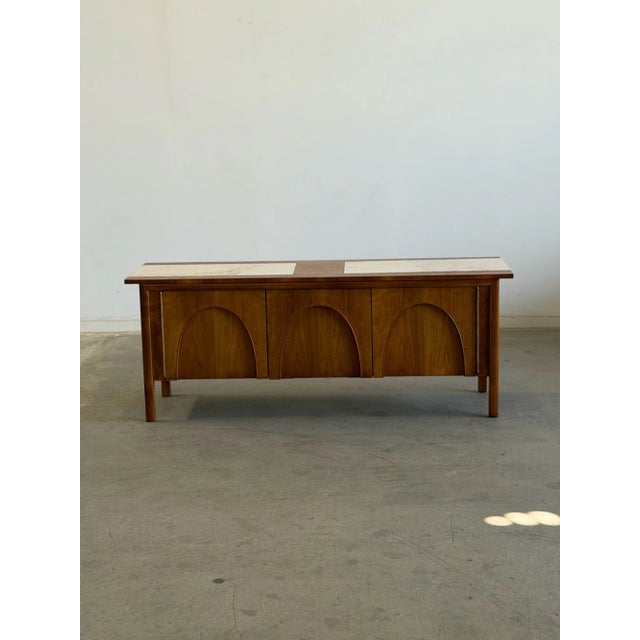 W60 D18 H23 Vintage 1960s arched walnut credenza by Drexel with a natural stone inlay top. With a mid-century modern feel...