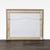 This is a framed black and white print by Ruben Robledo, featuring a striking photo of a weathered pier or dock structure....