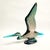 A large Abraham Palatnik (Brazil) heron bird sculpture with turquoise tones and an abstract animal texture print which are...