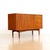 A stunning example of a model 9007 credenza designed by Peter Hayward for Vanson Furniture during the 1950s. The credenza...