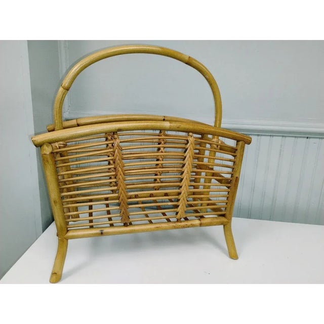 Mid Century Franco Albini Italian style bamboo and rattan magazine holder in pristine condition. The magazine rack shows...