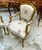 Bring timeless French elegance to your interior with this beautifully crafted armchair, featuring an ornate carved wood...