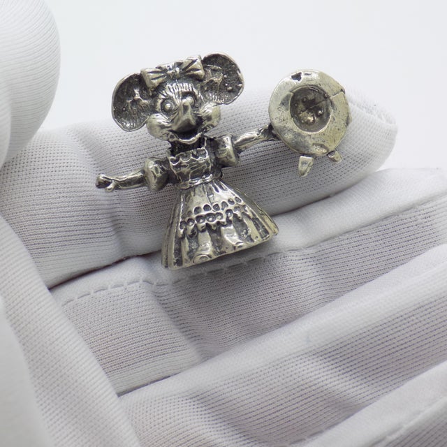 A charming country-style mouse figurine handcrafted in Italy during the 1980s/1990s. Made in Continental Silver (800/000)...
