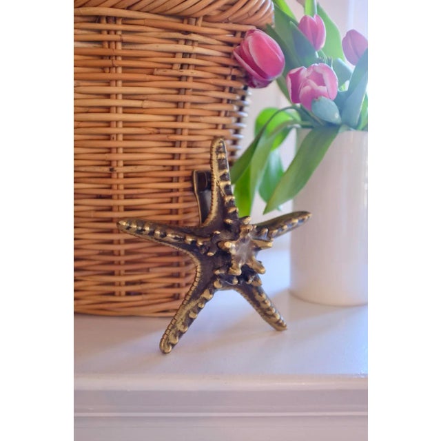 Very heavy and amazing vintage brass starfish door knocker. This will add so much fun and character to your front door....