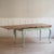 A beautiful and unique french country-style dining table with mint green legs and an artfully crafted natural wood top....