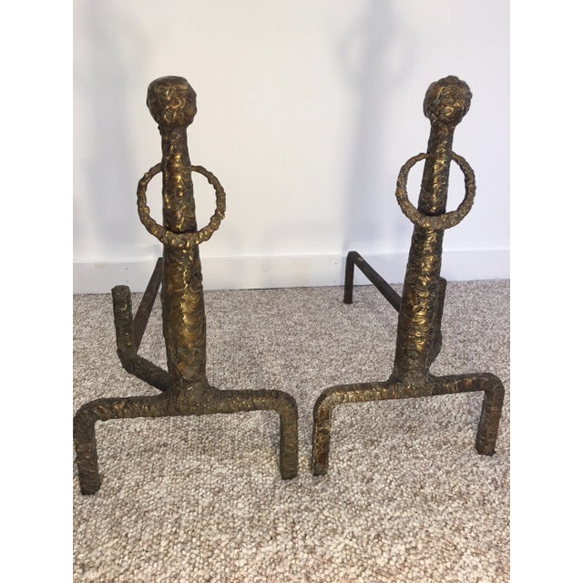 Rare pair of bronze Hand Sculpted Andirons are done in the manner of Alberto Giacometti and are composed of sculpted...