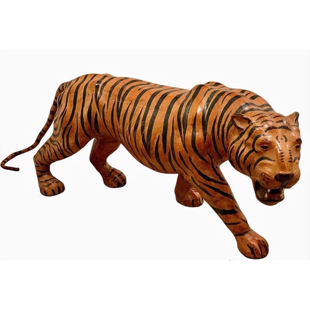 An Epic 1960s leather wrapped tiger. The colors are brilliant and details stunning. Glass eyes, fangs and whiskers add to...