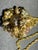 Intricate, multidimensional floral constructed pendant by Robert DeMario, inspired heavily by Haskell, whome he briefly...
