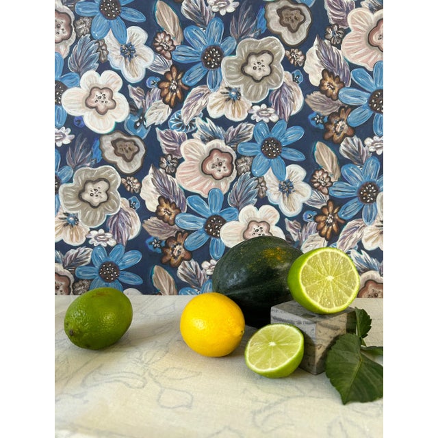 Hit the dance floor beneath the mirror ball and boogie till you can't boogie no more with this bold retro floral wallpaper...