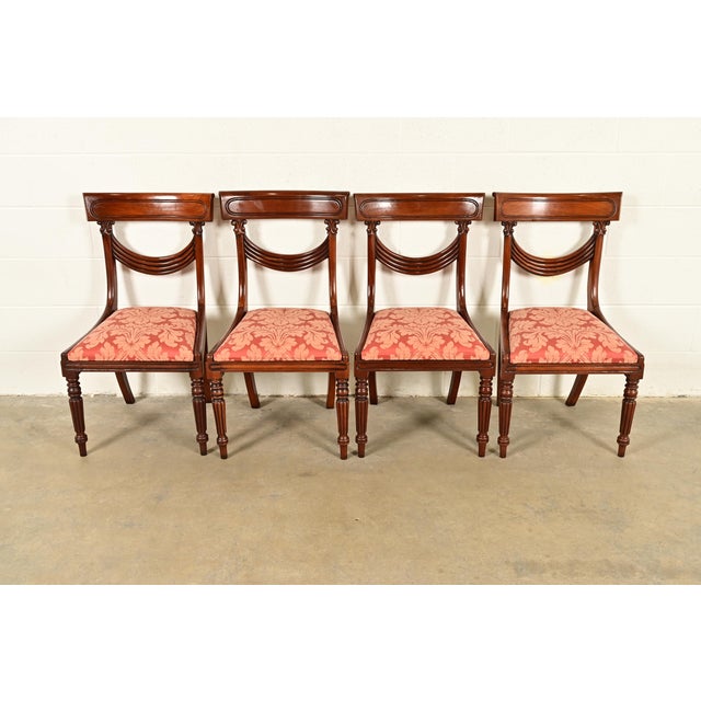 A gorgeous set of four Italian Provincial or English Regency style dining chairs In the manner of Baker Furniture USA,...