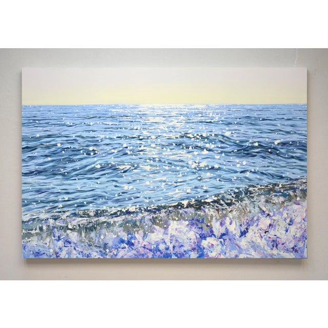I poured my heart into capturing the shimmering dance of sunlight on the restless sea, using acrylic to blend...
