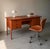 Freestanding Danish teak desk from the 1960s. Six side drawers, a central drawer and a fully finished back.