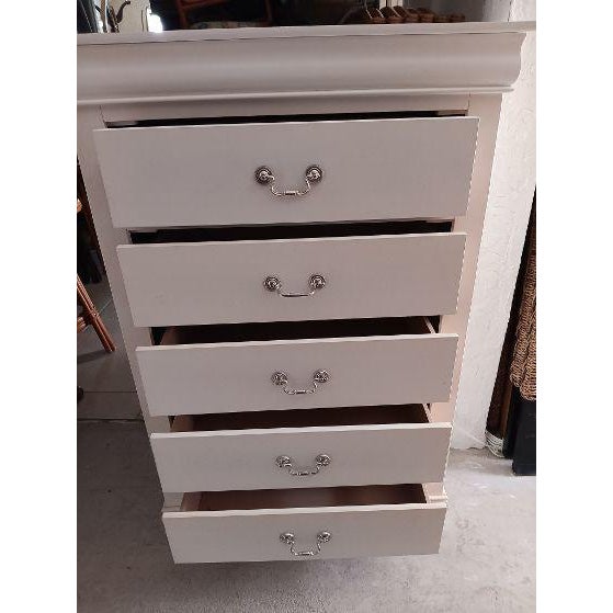 White coastal style wood chest 5 drawer Style: coastal Color: White Dimensions: 31 1/2" W x 48" H x 15 1/2" D