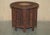 Royal House Antiques is delighted to offer for sale this lovely Burmese heavily carved side table which was retailed...