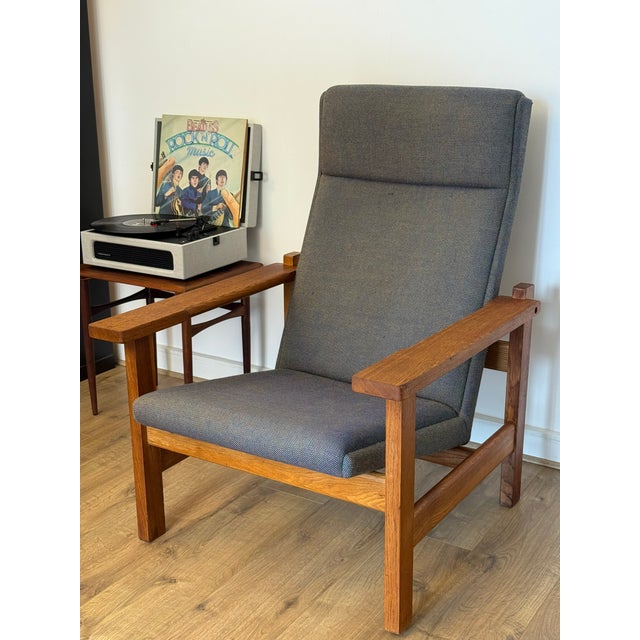 High-back reclining armchair designed by Hans J. Wegner and manufactured by Getama in Denmark. This is the model 163A,...