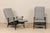 A pair of American Mid-Century reclining patio chairs. This pair of vintage iron patio chairs from the mid-20th century...